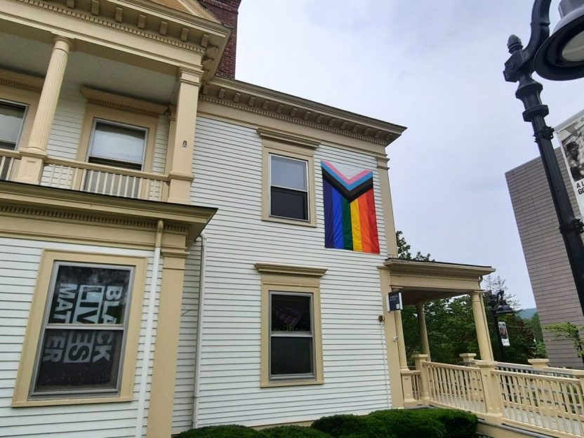 Exterior of the Davis Center with Pride flag on display