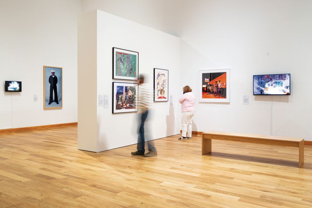 People viewing artwork inside WCMA