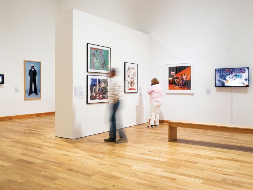 People viewing artwork inside WCMA