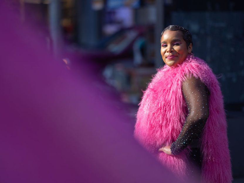 Image of Pamela Council wearing a pink boa