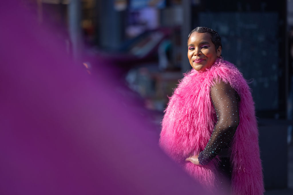 Image of Pamela Council wearing a pink boa