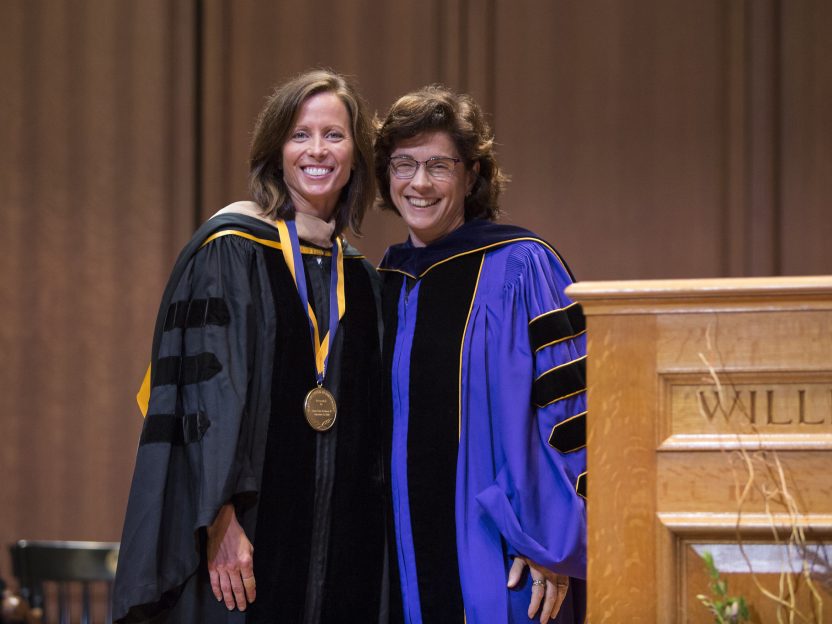 Photo of Adena Friedman and President Maud Mandel on stage at the Bicentennial awards ceremony.