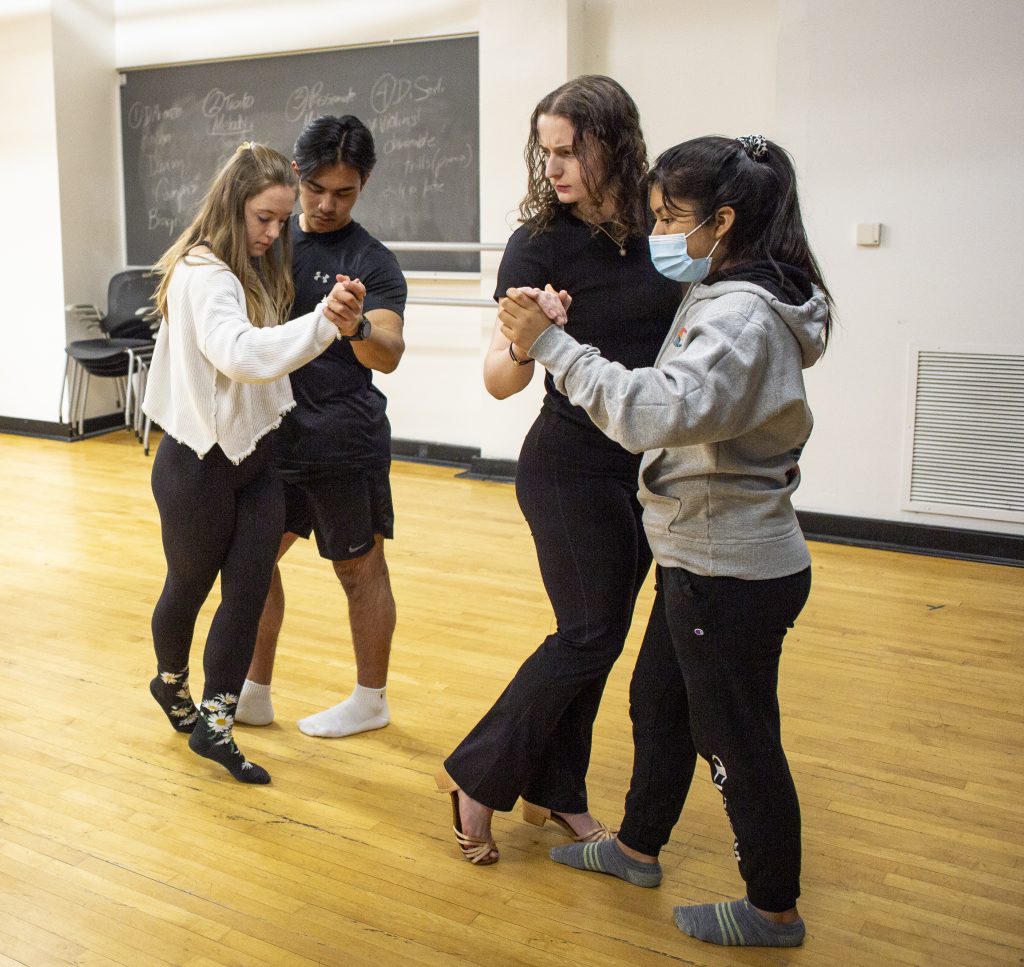 Students learning the basics of Argentinian tango dancing.