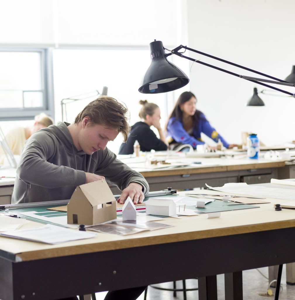 Students work on projects in the Sugar House Winter Study course .