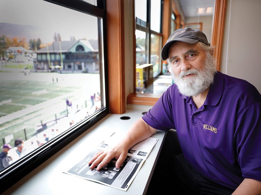 Photo of Dick Quinn overlooking the football field
