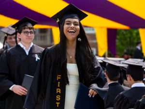 A photo of graduates accept their diplomas at Williams' 236th Commencement in June 2025.