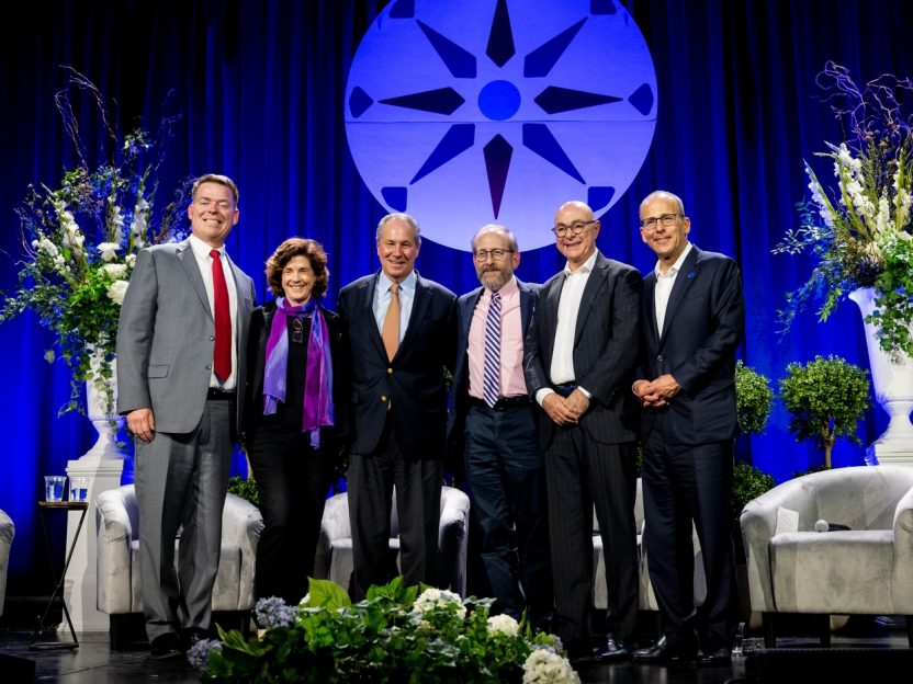 President Mandel, second from left, joins a discussion on the role of higher education today.
